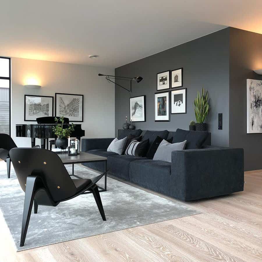 Modern living room with dark gray sofa and wall