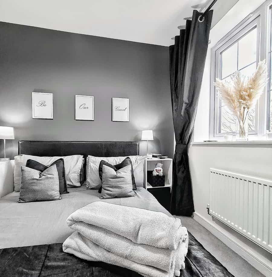 Themed bedroom with dark grey tones and plush textures