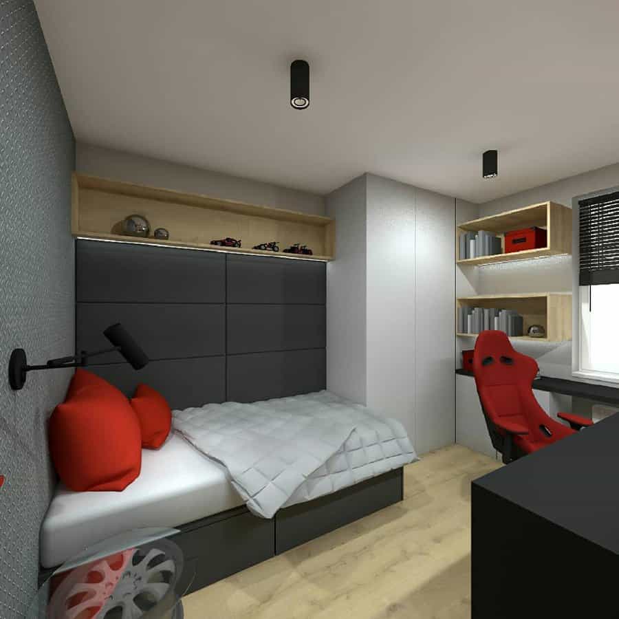 Compact bedroom with study area and red chair