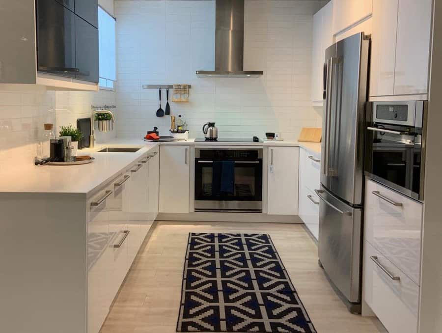 small kitchen with runner rug