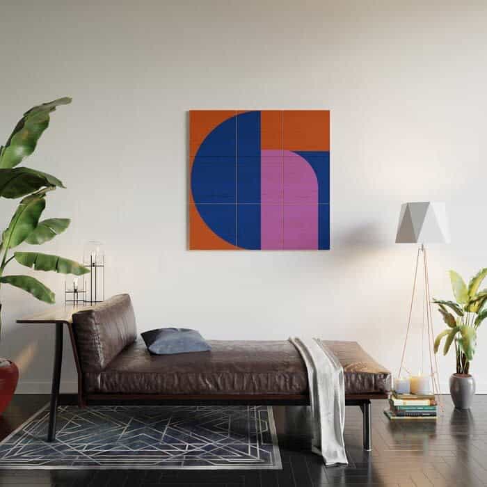 Living room decor with abstract painting above the couch