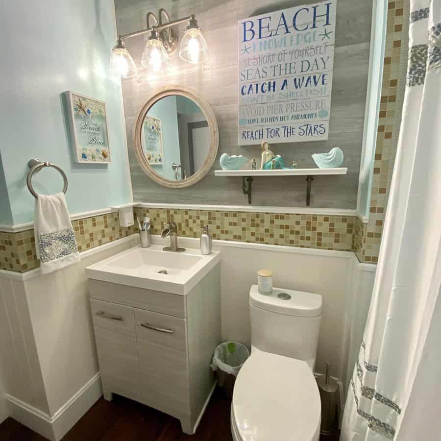 beach bathroom with wall decor