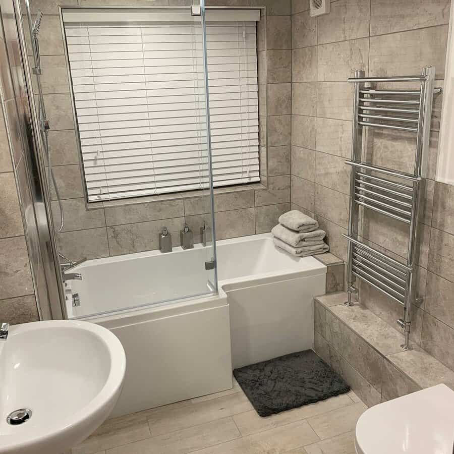 Bathroom with combined tub and shower setup