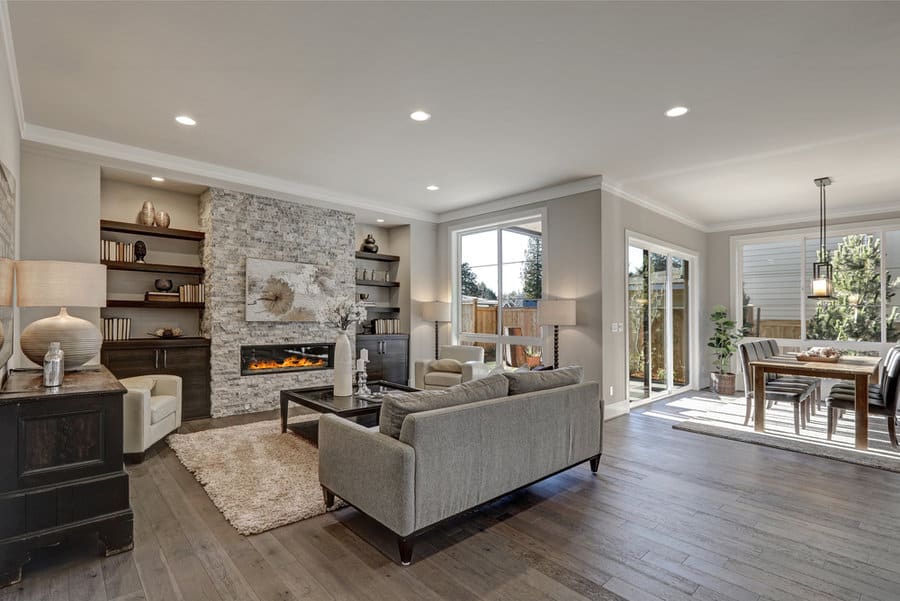 Living room featuring gray walls and wooden furniture