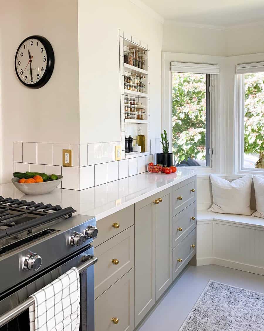 Small galley kitchen with gold fixtures