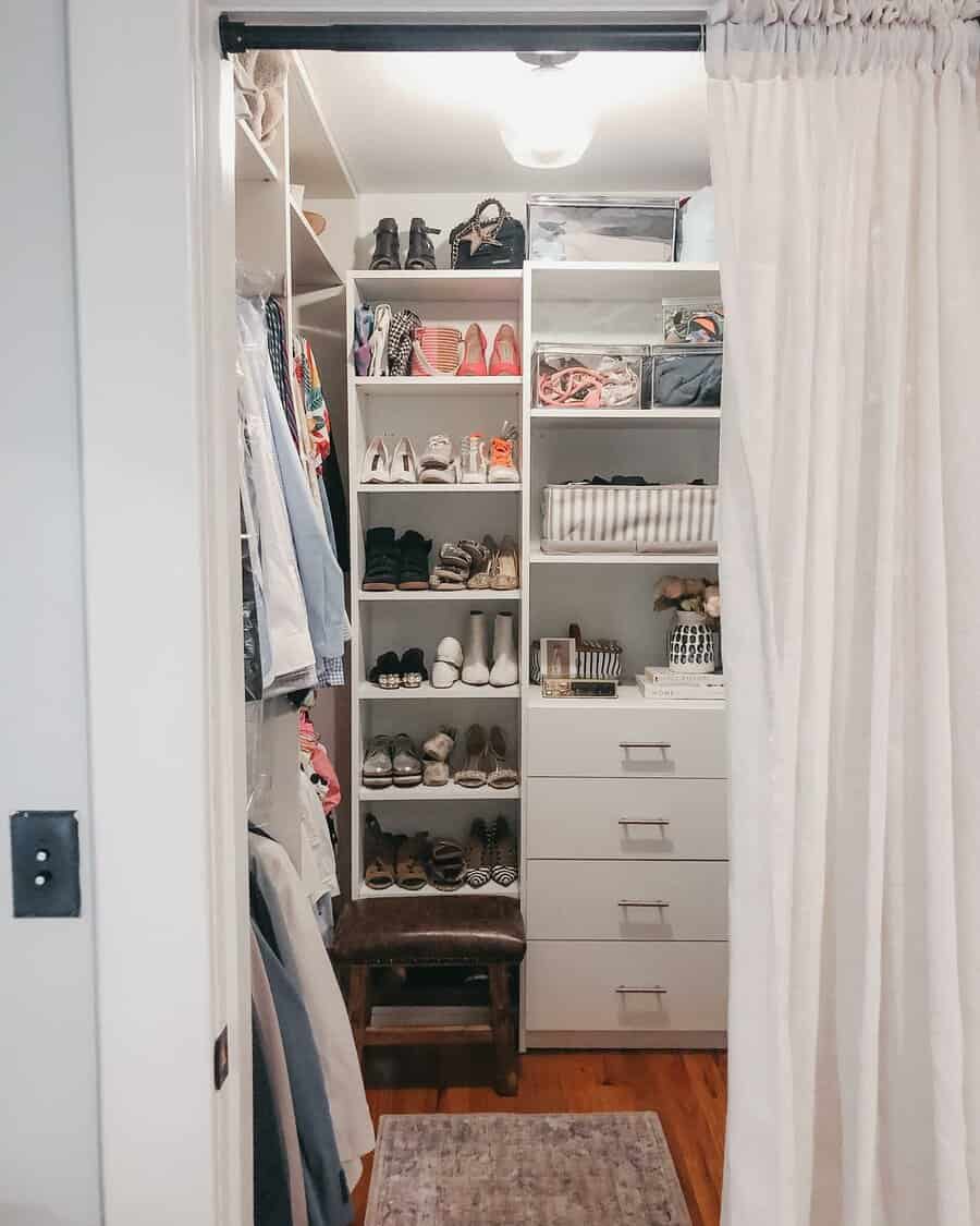 small closet with vertical shelves