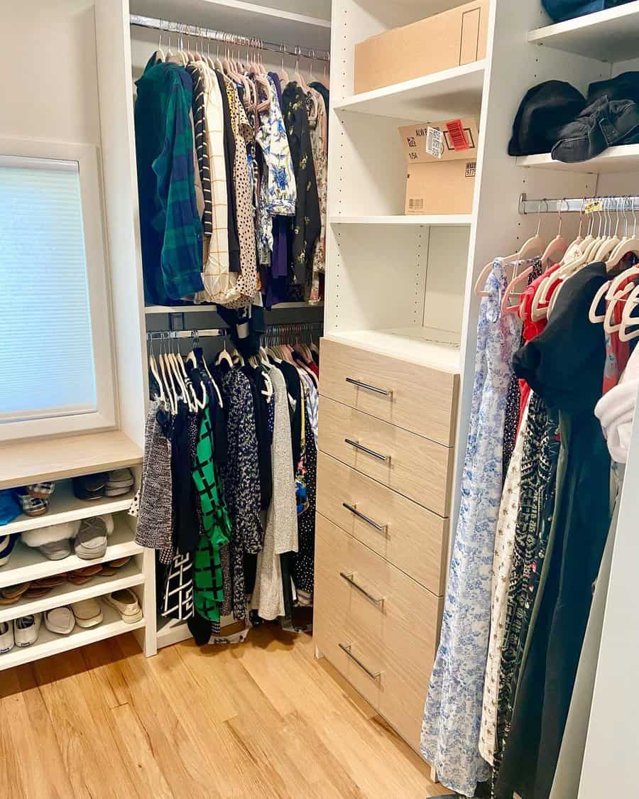 Walk in closet with functional seating