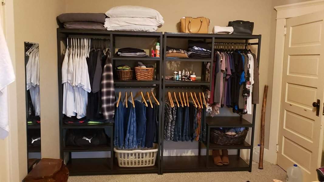 Walk in closet with functional seating