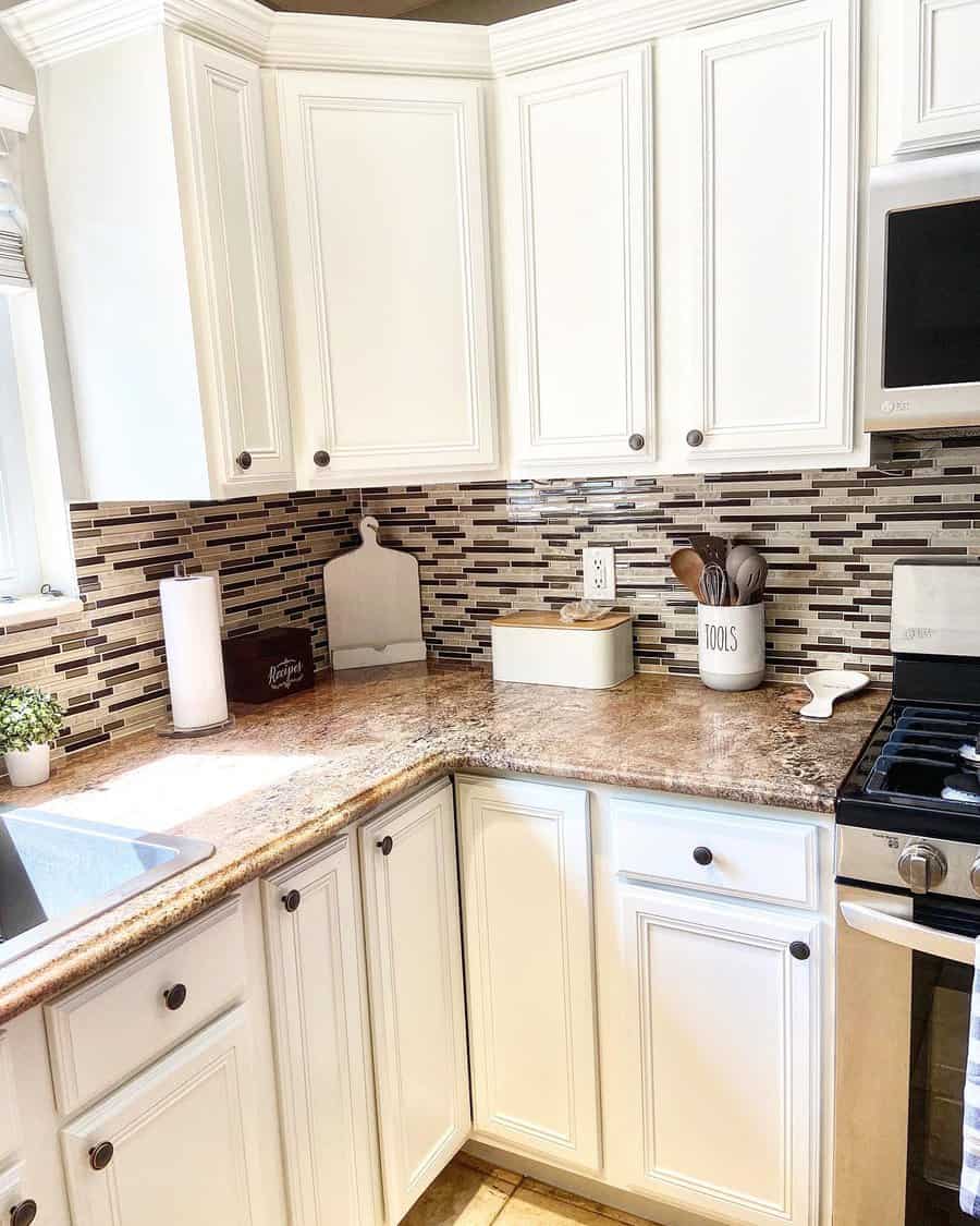 Corner white kitchen cabinet