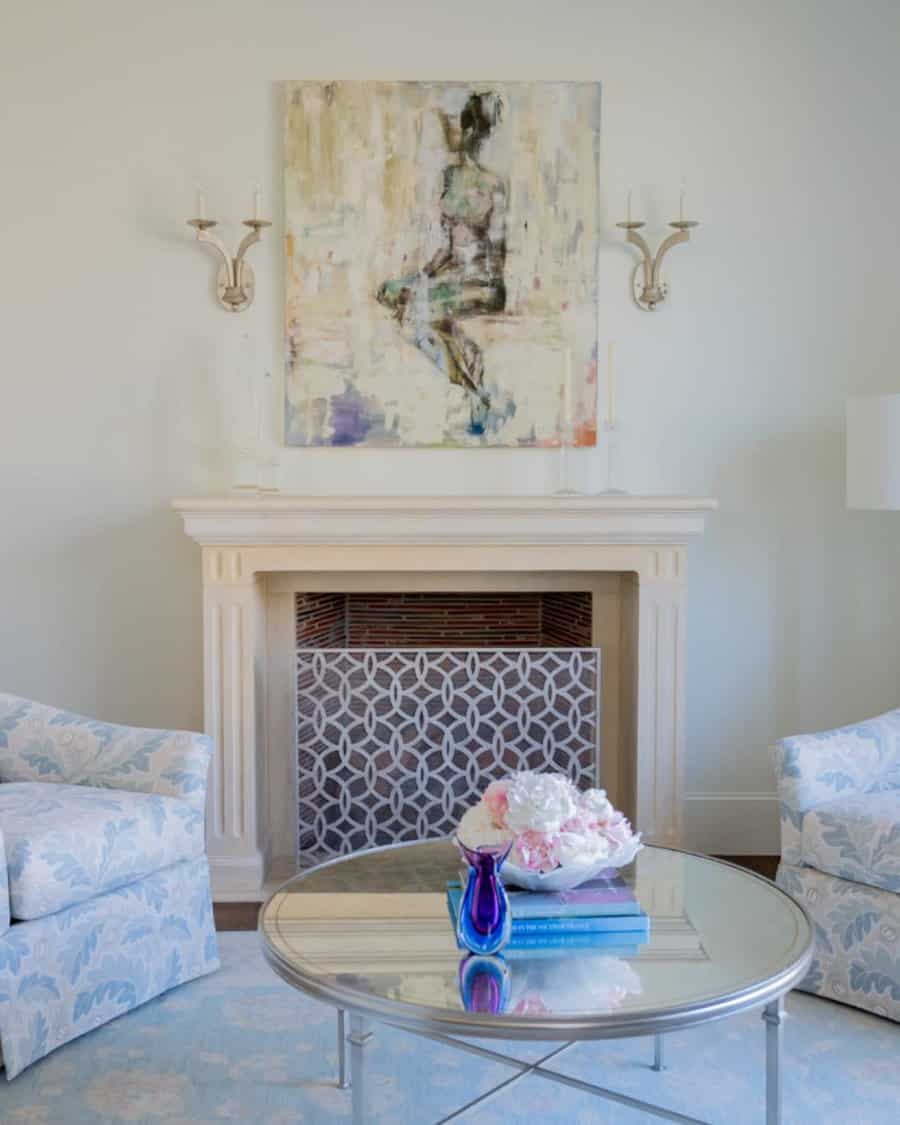 Blue and white furniture in the living room with a wall painting