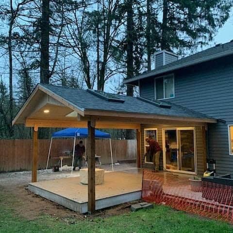 covered deck with bungalow style roof