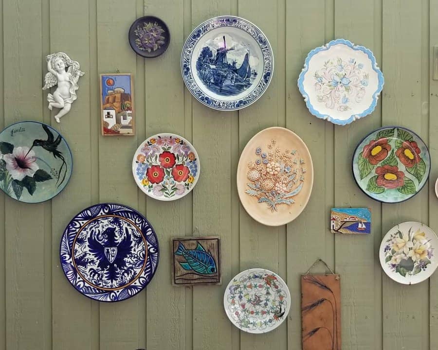 Decorative vintage plates on a wooden wall