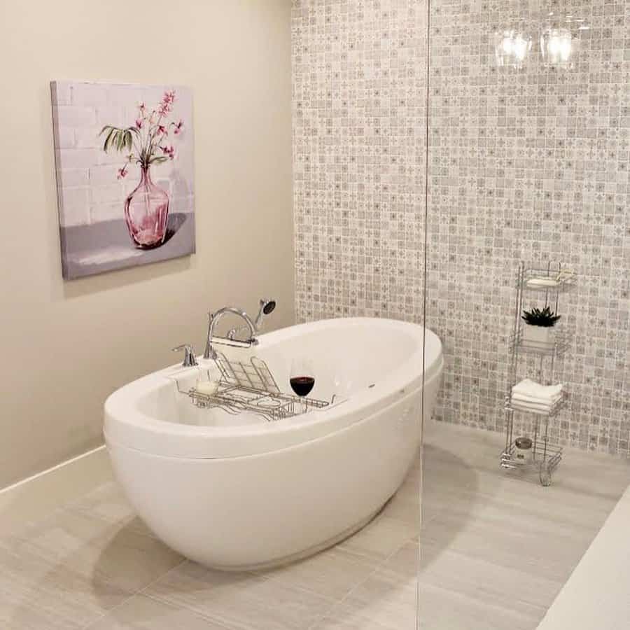 Cozy bathroom with art and freestanding tub