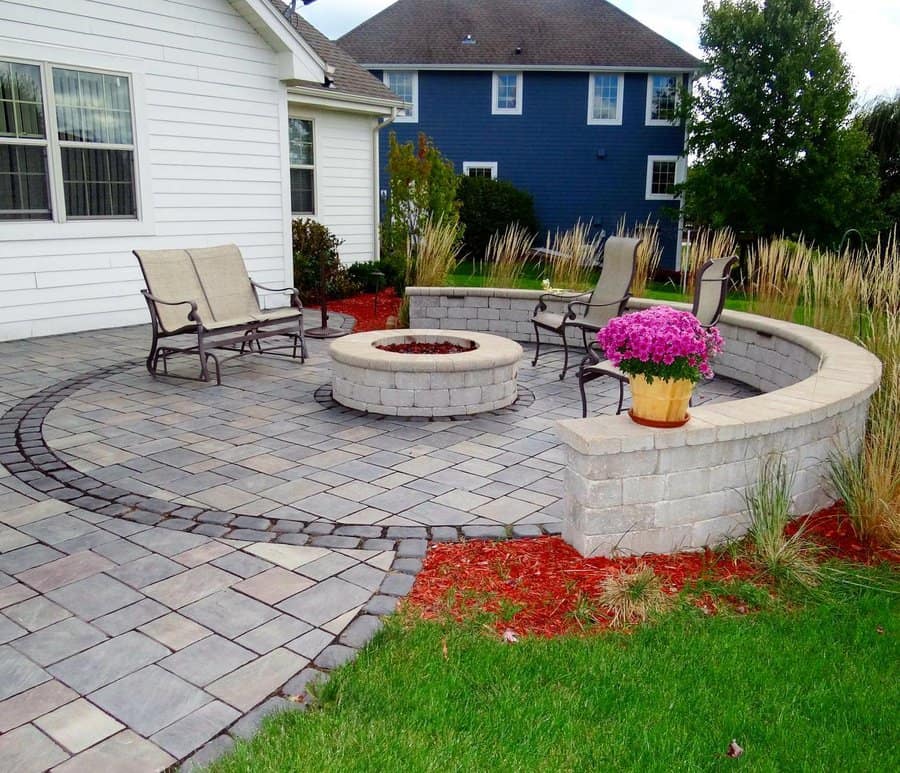 Paver patio with fire pit and vibrant landscaping