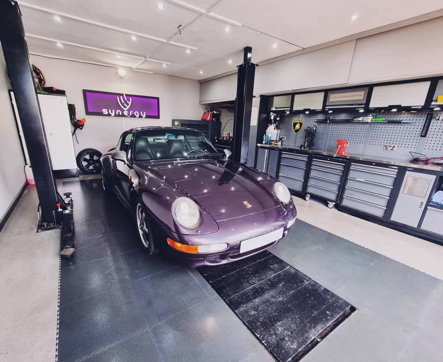 Sleek garage with classic car and tool storage