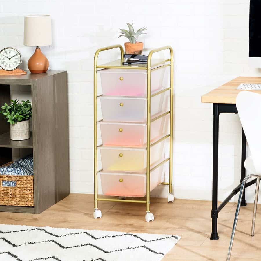 Rolling cart with pastel drawers in a chic room