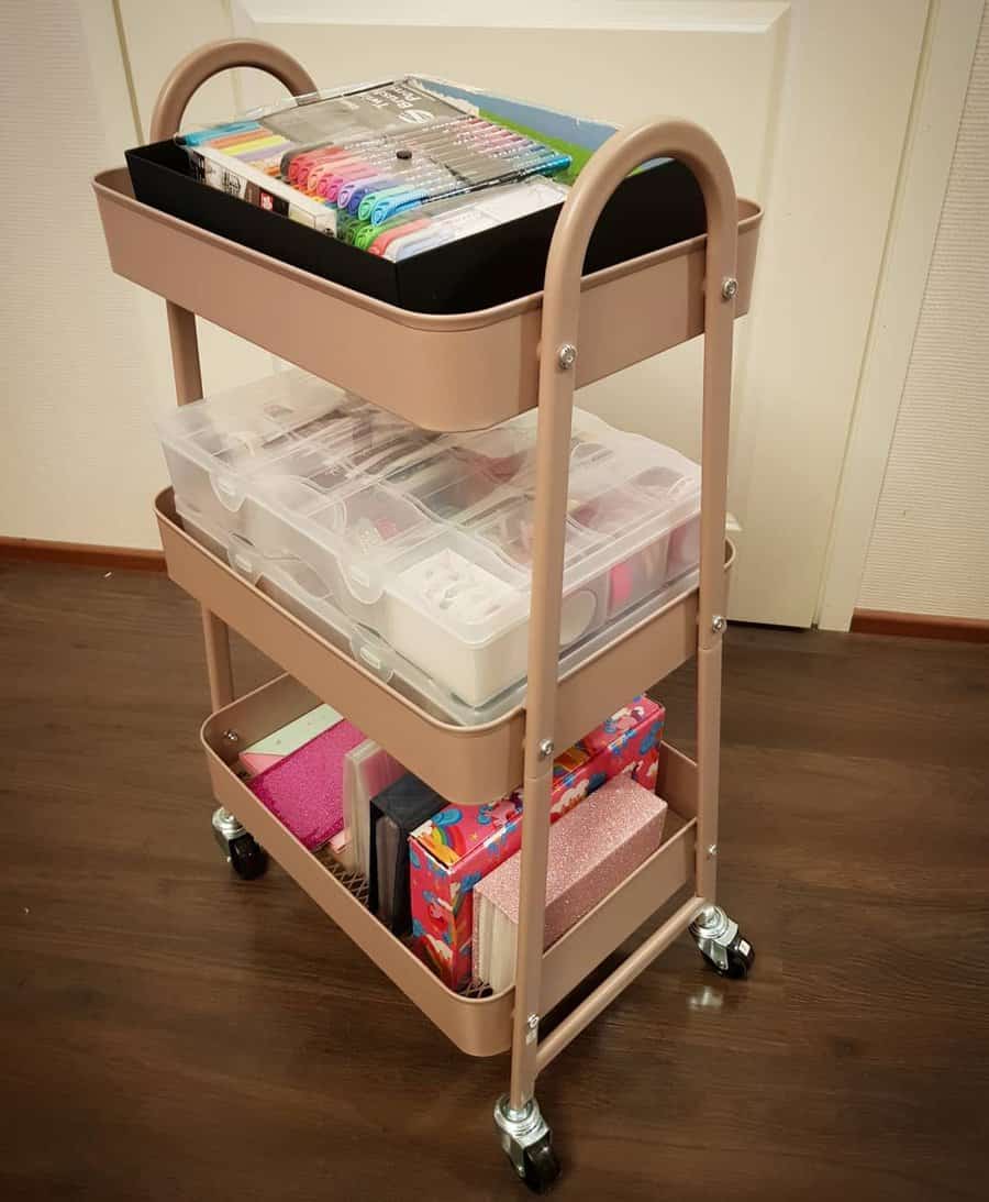 Mobile storage trolley with craft supplies