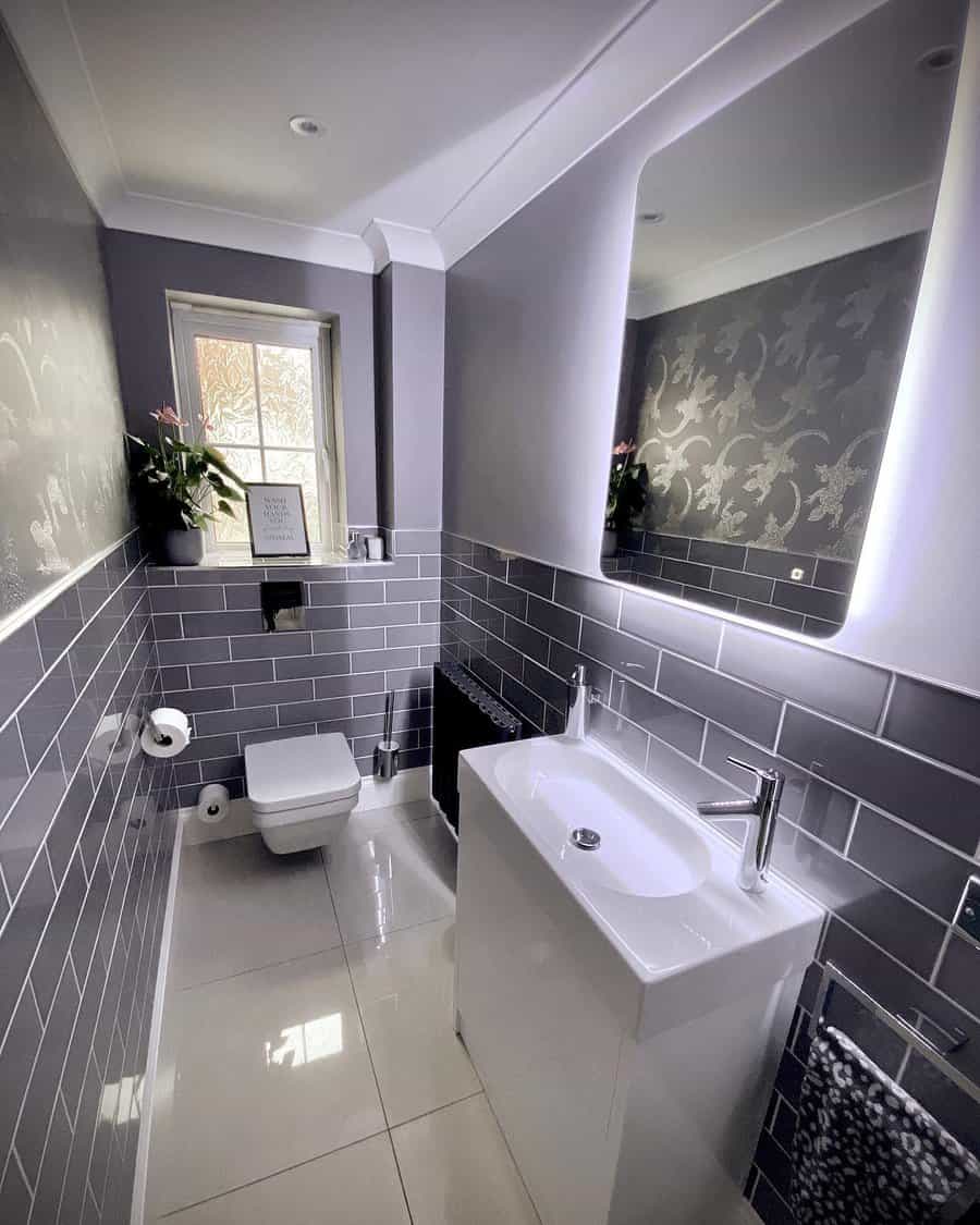 grey bathroom with LED strips