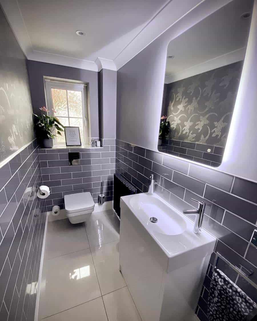 Powder rooms with light grey tones