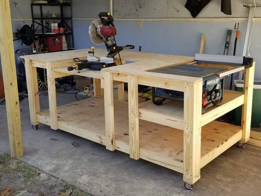 Spacious wooden workbench with integrated power tools