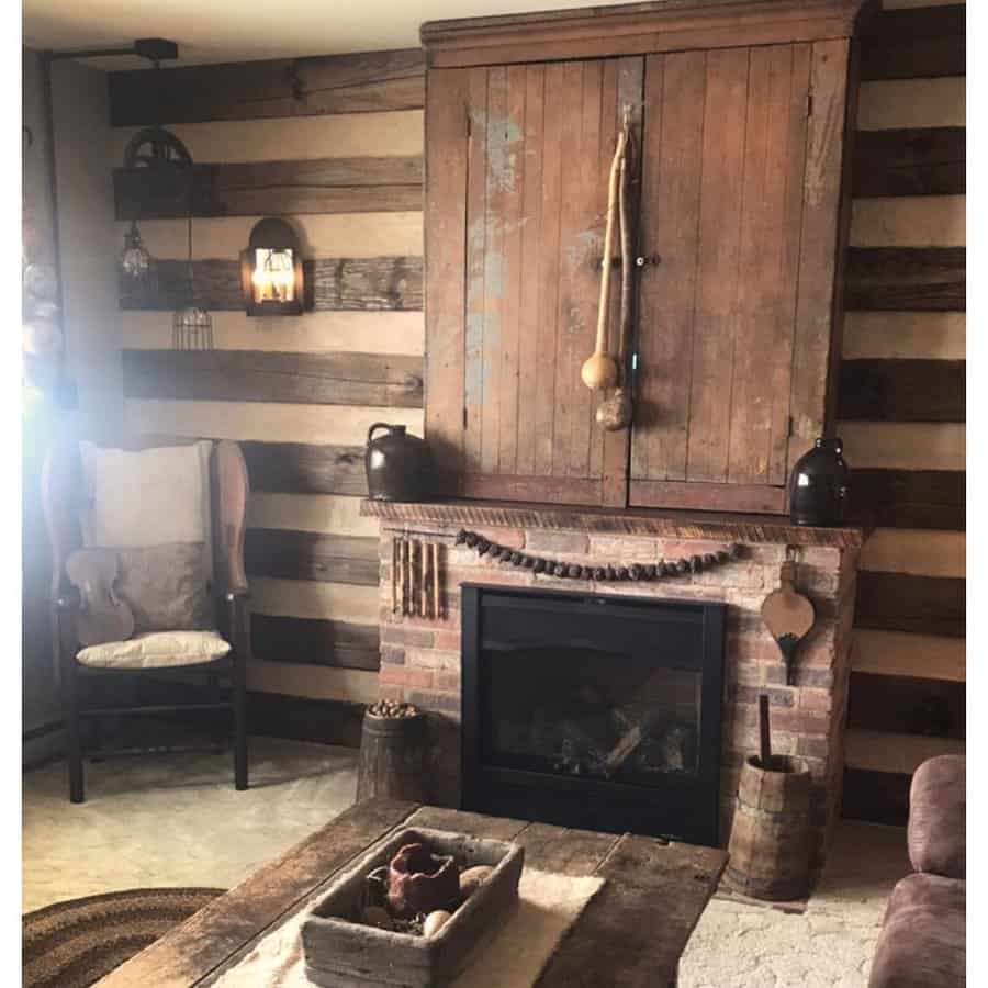 Rustic living room with reclaimed wood wall and fireplace