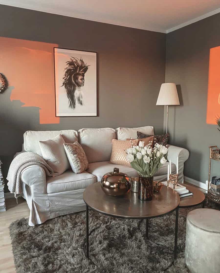 Stylish living room with orange walls and sleek grey furniture