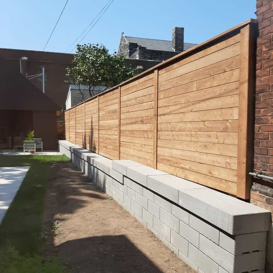 Wood and concrete block fence