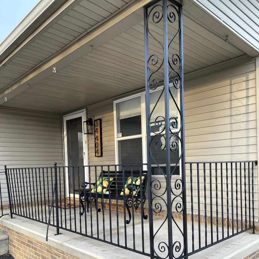 small porch with railing