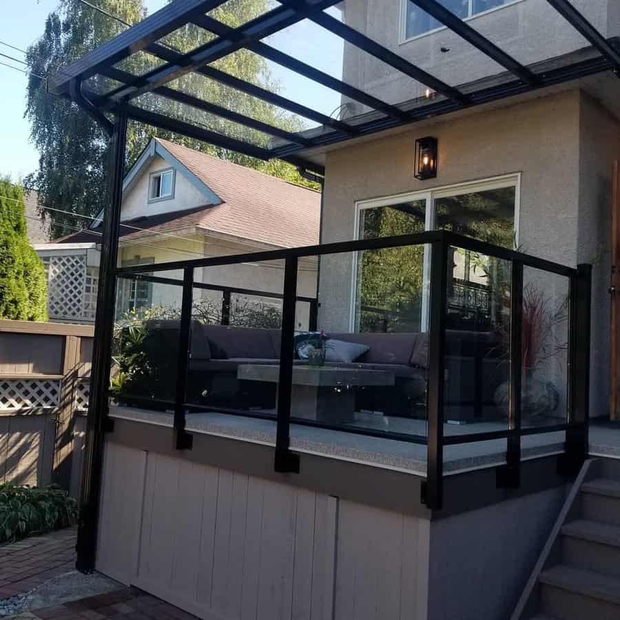 Back porch with glass railing