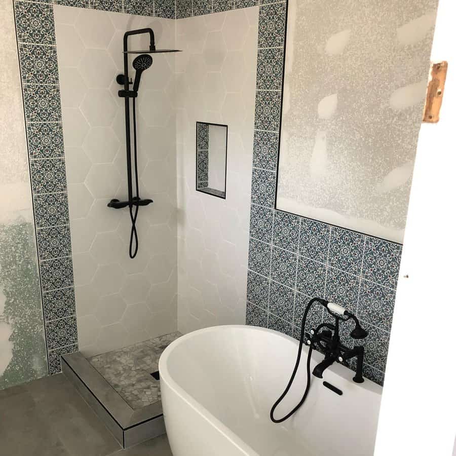 Bathroom shower with blue decorative tiles