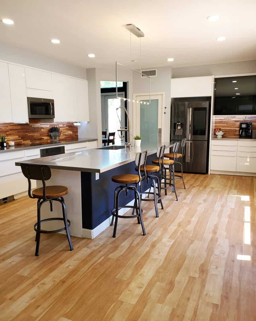 modern kitchen with wood panel backsplash 