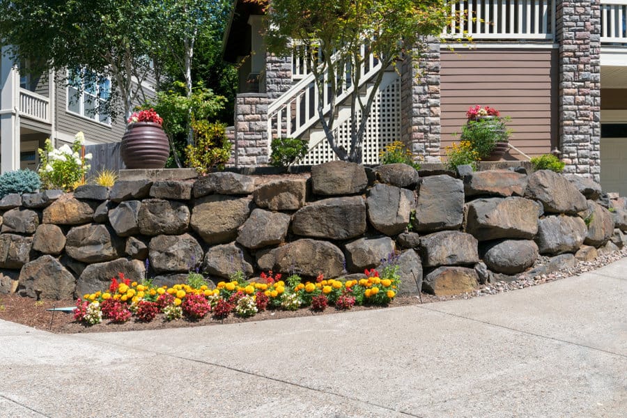 Rocks and Boulders Inexpensive Retaining Wall Ideas 4