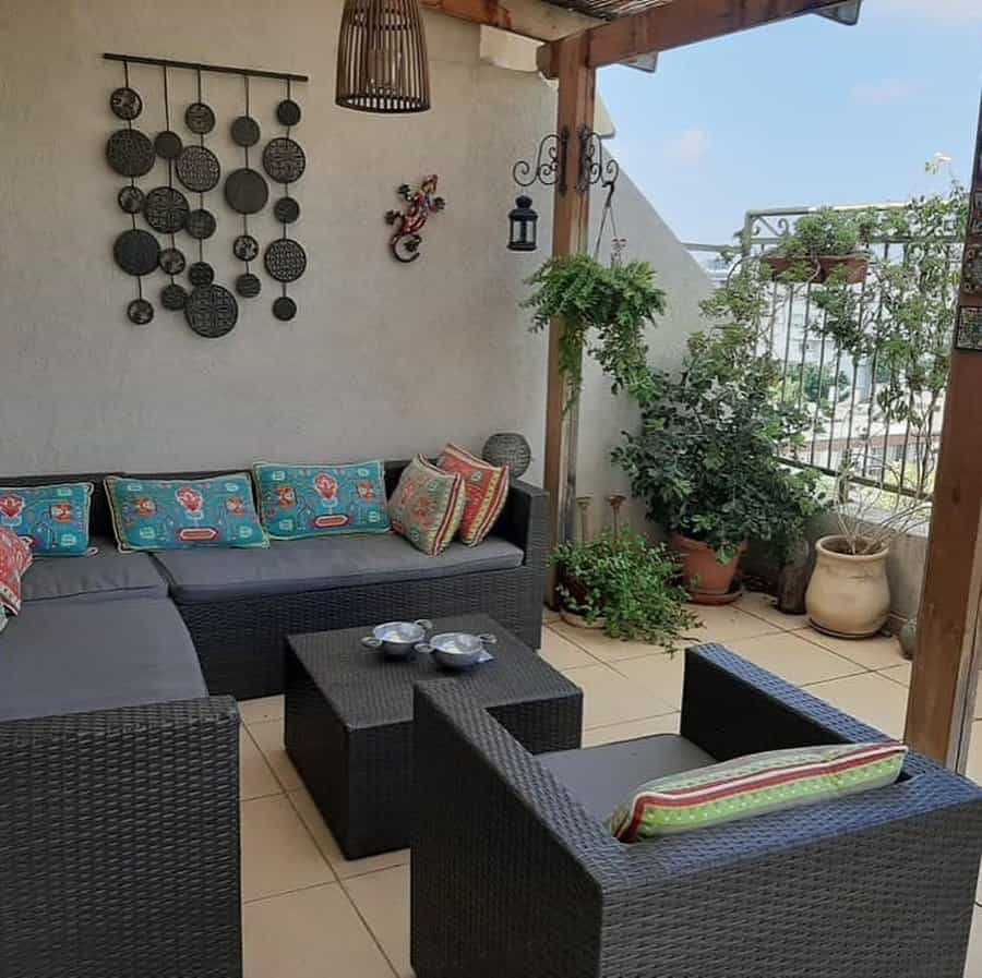 Apartment patio with wicker furniture