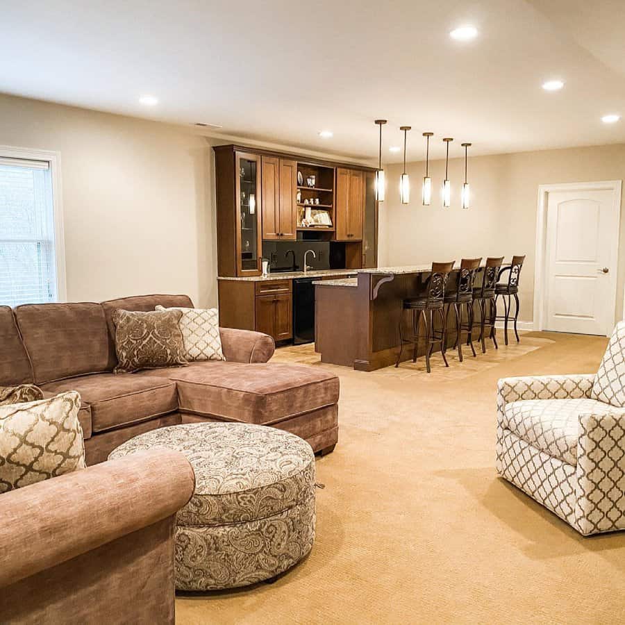 Inviting basement lounge with bar and comfortable seating