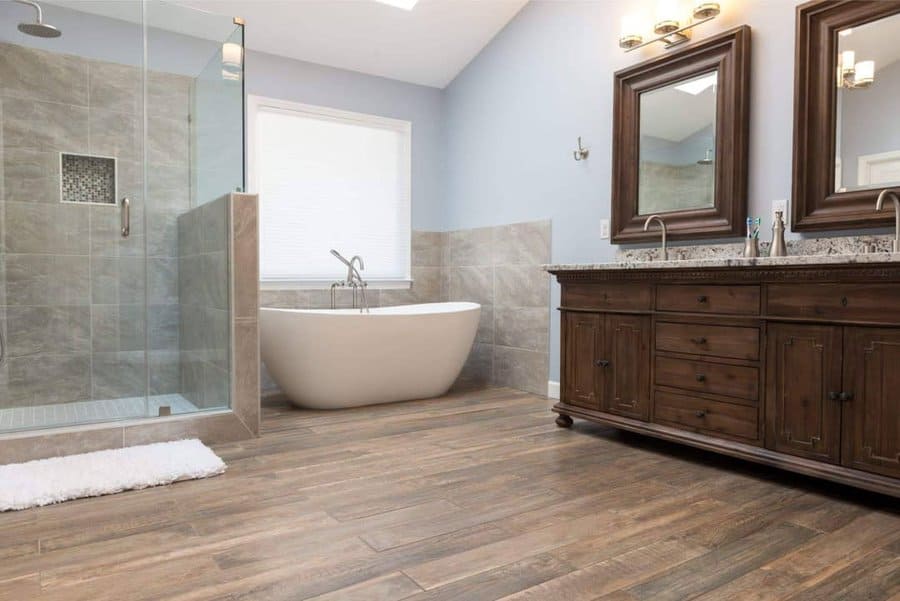 Rustic bathroom with wood vanity and freestanding tub