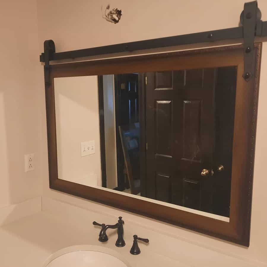 wooden-framed mirror