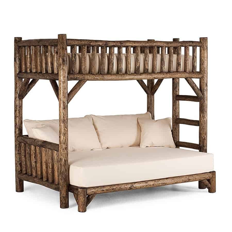 Rustic bunk bed with a sturdy wooden frame, featuring a ladder and cream-colored cushions on the bottom bunk