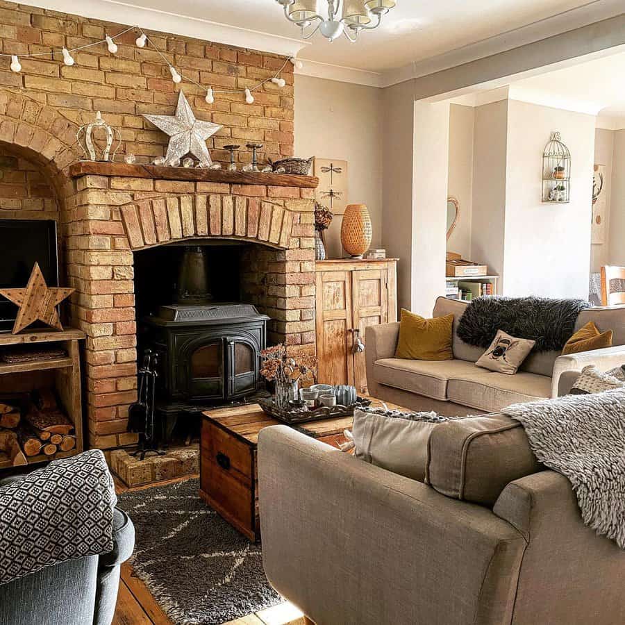 Warm rustic living room with brick fireplace and wood accents