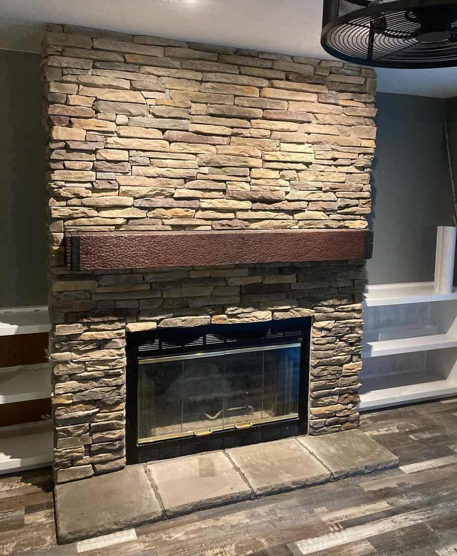 Stamped stone fireplace wall