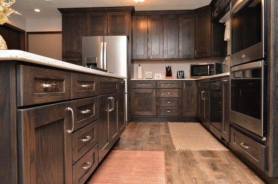 Dark oakwood kitchen cabinets