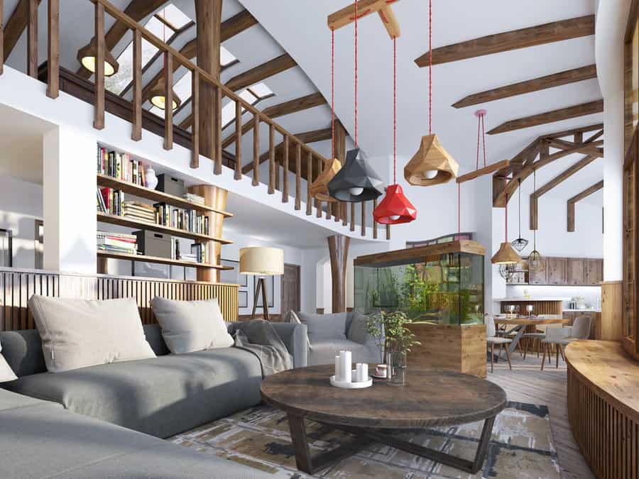 Spacious living room with loft library and wooden beams