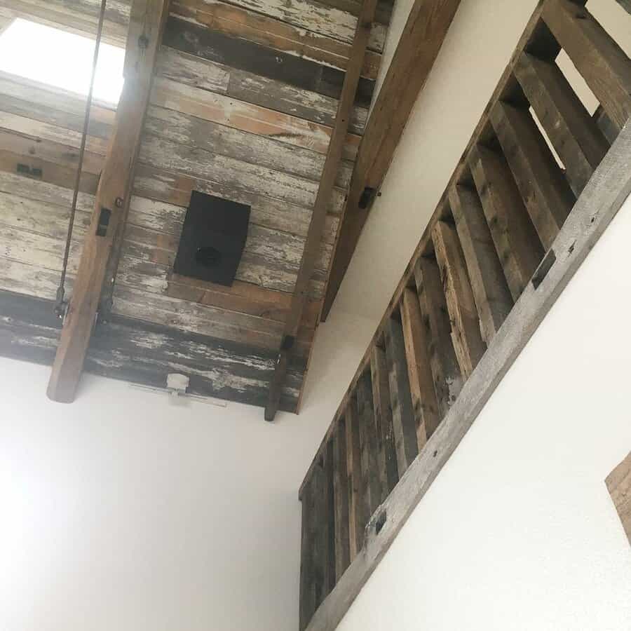 Rustic loft with pallet wood and ladder