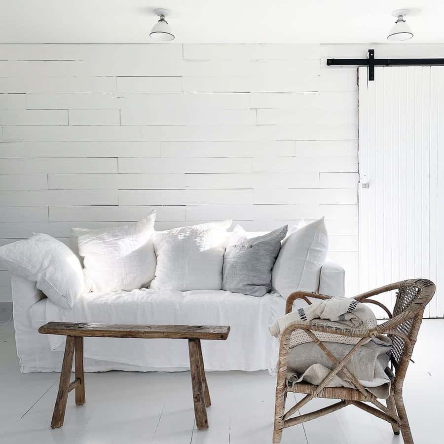 Minimalist living room with white palette and natural textures