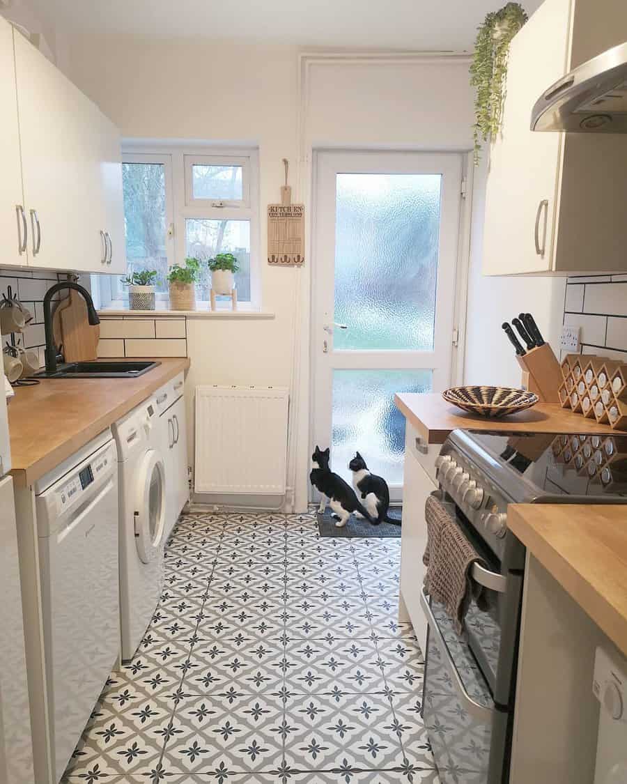 small galley kitchen with wooden countertop