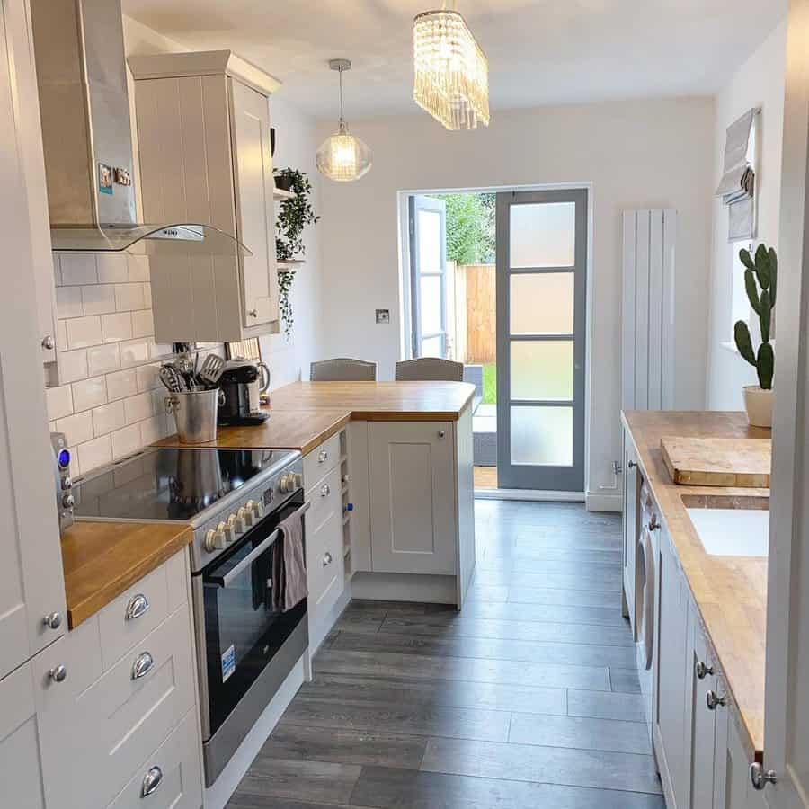 Small galley kitchen with wooden countertop