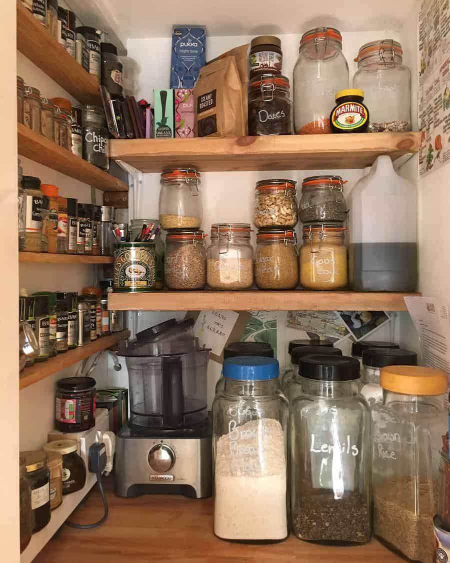 Kitchen pantry shelves filled with jars and food items