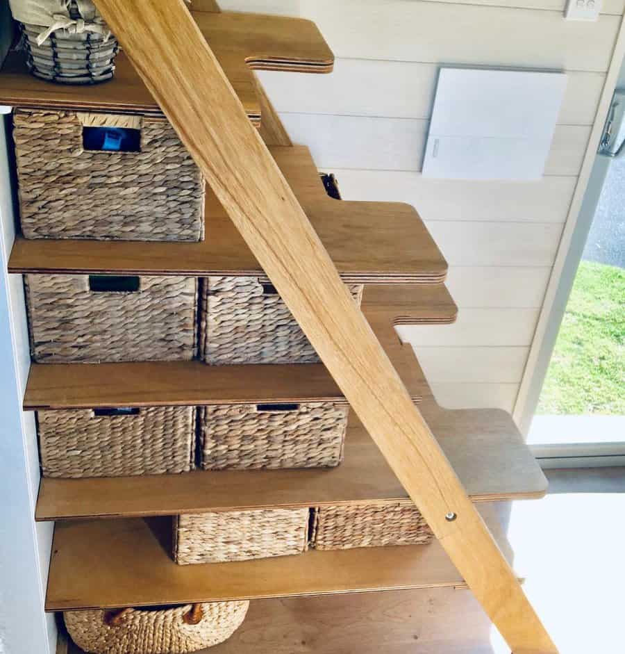 Wooden staircase with integrated wicker basket storage