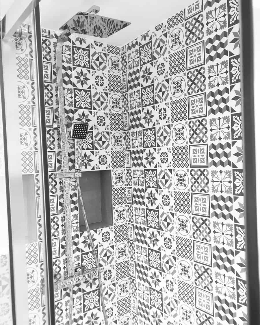 Artistic black and white shower tiles