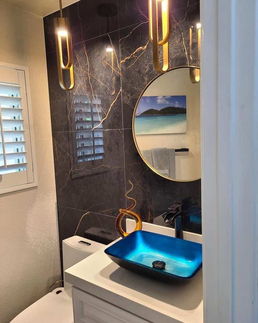 Half bathroom with pendant lights