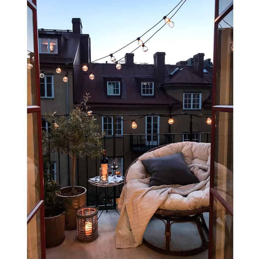 apartment balcony with string lights